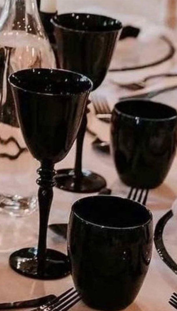 Red wine black glasses and water glasses